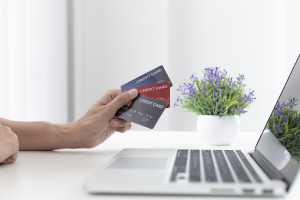 Credit cards being held by business owner